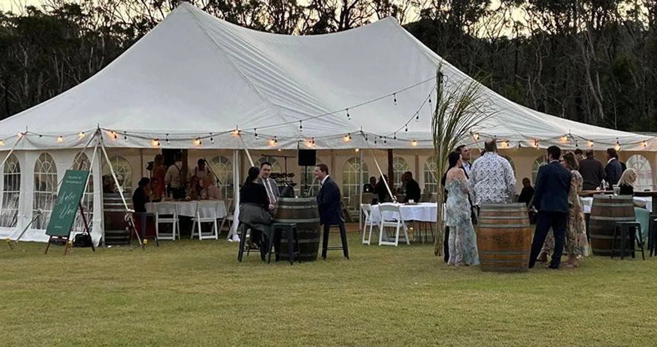 group of people celebrating a marquee wedding 1